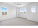 Bright bedroom featuring carpet and multiple windows at 933 Bluffview Dr., Myrtle Beach, SC 29579