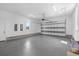 Attached garage with epoxy flooring and shelving at 933 Bluffview Dr., Myrtle Beach, SC 29579