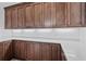 Well-appointed kitchen with dark wood cabinets and expansive counter space at 933 Bluffview Dr., Myrtle Beach, SC 29579
