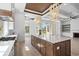 Open kitchen with large island, stainless steel appliances, and breakfast area at 933 Bluffview Dr., Myrtle Beach, SC 29579
