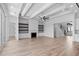 Spacious living room with hardwood floors, fireplace and built-in shelving at 933 Bluffview Dr., Myrtle Beach, SC 29579