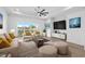 Bright living room with comfortable seating and large TV at 933 Bluffview Dr., Myrtle Beach, SC 29579