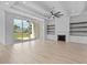 Bright living room with hardwood floors, built-in shelving and fireplace at 933 Bluffview Dr., Myrtle Beach, SC 29579