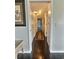 Long hallway with dark wood floors and access to bedrooms at 4214 Pinehurst Circle # G9, Little River, SC 29566