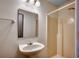 Bright bathroom with a single sink vanity and a shower with tub at 1095 W Plantation Dr. W # 28D, Little River, SC 29566