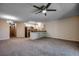 Spacious living room featuring updated kitchen with stainless steel appliances at 1095 W Plantation Dr. W # 28D, Little River, SC 29566