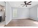 Bright bedroom with hardwood floors, large windows and a ceiling fan at 219 West Palms Dr., Myrtle Beach, SC 29579