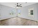 Bright bedroom with natural light, ceiling fan and beautiful hardwood floors at 219 West Palms Dr., Myrtle Beach, SC 29579