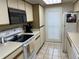 Well-equipped kitchen featuring modern appliances and plenty of cabinet space at 645 Retreat Beach Circle, Pawleys Island, SC 29585