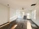 Bright living room with white walls and wood flooring at 189 Brown Pelican Loop, Pawleys Island, SC 29585