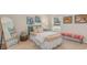 Cozy bedroom features a bed, full length mirror and decor with window view to the outside at 90 Arbor Crest Ln., Tabor City, NC 28463