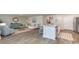 Open-concept living room featuring a modern kitchen island and stylish furniture, perfect for entertaining and relaxing at 90 Arbor Crest Ln., Tabor City, NC 28463