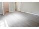 Spacious bedroom with wood-look floors and a ceiling fan at 412 Callie Dr., Myrtle Beach, SC 29588