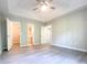 White storage shed with double doors, providing ample outdoor storage space at 412 Callie Dr., Myrtle Beach, SC 29588
