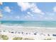 Expansive ocean view from condo overlooking the beach with light blue skies at 5800 N Ocean Blvd. # 705, North Myrtle Beach, SC 29582