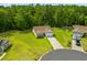 Aerial view of the home showcasing lush greenery and well-manicured landscaping at 252 Timber Run Dr., Georgetown, SC 29440