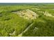 An aerial view of the community nestled among tall trees and winding roads at 252 Timber Run Dr., Georgetown, SC 29440