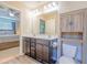Bright bathroom featuring double sinks and a view into the main bedroom at 252 Timber Run Dr., Georgetown, SC 29440