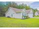 Charming single-story home with a well-manicured lawn and attached garage at 252 Timber Run Dr., Georgetown, SC 29440
