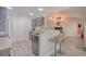 Stylish kitchen featuring dark cabinets, granite countertops, and a convenient breakfast bar area at 252 Timber Run Dr., Georgetown, SC 29440