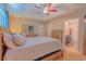 This bedroom features a neutral color palette, a ceiling fan, and an ensuite bathroom at 252 Timber Run Dr., Georgetown, SC 29440