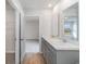 Bathroom featuring a double vanity, modern fixtures, and neutral decor at 116 Arbor Crest Ln., Tabor City, NC 28463