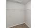 Empty closet with wire shelving and soft carpet flooring offering storage solutions at 116 Arbor Crest Ln., Tabor City, NC 28463