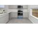 A well-equipped kitchen featuring stainless steel appliances and light-colored countertops at 116 Arbor Crest Ln., Tabor City, NC 28463