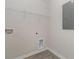 Well-equipped laundry room features modern flooring and convenient shelving for organized storage solutions at 116 Arbor Crest Ln., Tabor City, NC 28463