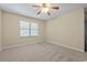 Bright bedroom featuring neutral walls and carpet at 6625 Scotsman Crescent, Myrtle Beach, SC 29588