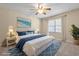 Virtually staged bedroom with a king-size bed and coastal decor at 6625 Scotsman Crescent, Myrtle Beach, SC 29588