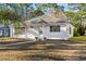 House exterior with walkway, landscaping and covered entry at 6625 Scotsman Crescent, Myrtle Beach, SC 29588