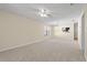 Large living room with ample natural light and ceiling fan at 6625 Scotsman Crescent, Myrtle Beach, SC 29588