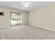 Bright living room featuring sliding glass doors to a patio at 6625 Scotsman Crescent, Myrtle Beach, SC 29588