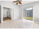 Bright office with tile flooring, a ceiling fan, natural light, and access to the backyard at 910 Emanon St., North Myrtle Beach, SC 29582