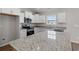 Modern kitchen featuring granite countertops and stainless steel appliances at 355 Barn Owl Way, Conway, SC 29527