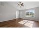 Bright living room featuring hardwood floors and a ceiling fan at 355 Barn Owl Way, Conway, SC 29527