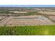 Aerial view of new neighborhood with pond at 623 Snowy Owl Way, Conway, SC 29527