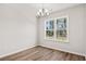 Bright dining room with hardwood floors and a view of the backyard at 623 Snowy Owl Way, Conway, SC 29527