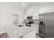 Modern kitchen featuring stainless steel appliances and granite countertops at 623 Snowy Owl Way, Conway, SC 29527