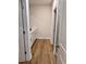 Bathroom with white cabinets and wood flooring at 882 Liberty Church Rd., Loris, SC 29569