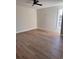 Bright bedroom featuring hardwood floors and a ceiling fan at 882 Liberty Church Rd., Loris, SC 29569