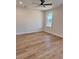 Spacious bedroom with wood flooring and ceiling fan at 882 Liberty Church Rd., Loris, SC 29569