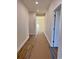 Bright hallway with light walls and wood flooring at 882 Liberty Church Rd., Loris, SC 29569