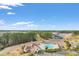 Aerial view of community pool, clubhouse, and homes at 573 Beckham Ct., Murrells Inlet, SC 29576