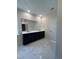 Double vanity bathroom with dark cabinets and quartz countertops at 573 Beckham Ct., Murrells Inlet, SC 29576