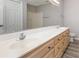 Bathroom featuring a double sink vanity and a large mirror at 9138 Wildwood Pl., Murrells Inlet, SC 29576