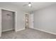 Bedroom has neutral carpet, a ceiling fan, and closet at 9138 Wildwood Pl., Murrells Inlet, SC 29576