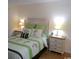 Bright bedroom with a queen-size bed and two nightstands at 501 Maison Dr. # B3, Myrtle Beach, SC 29572