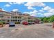 Multi-story building exterior with parking lot at 501 Maison Dr. # B3, Myrtle Beach, SC 29572